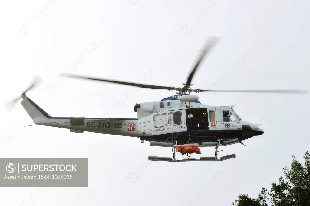 Rescue helicopter transporting a body