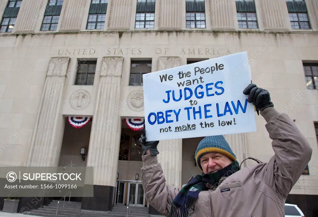 Detroit, Michigan - Activists mark the second anniversary of the Supreme Court´s ´Citizens United´ decision by picketing the federal courthouse  ´Citi...