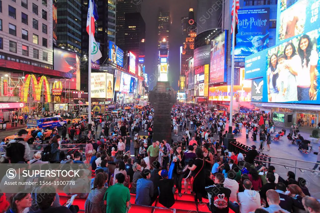 The night view of Times Square packed with visitors  Manhattan  New York City  USA.