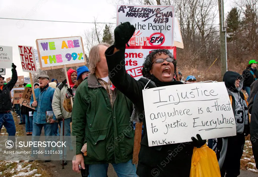 Superior Township, Michigan - About a thousand people marched to the home of Michigan Governor Rick Snyder to protest Michigan´s emergency financial m...