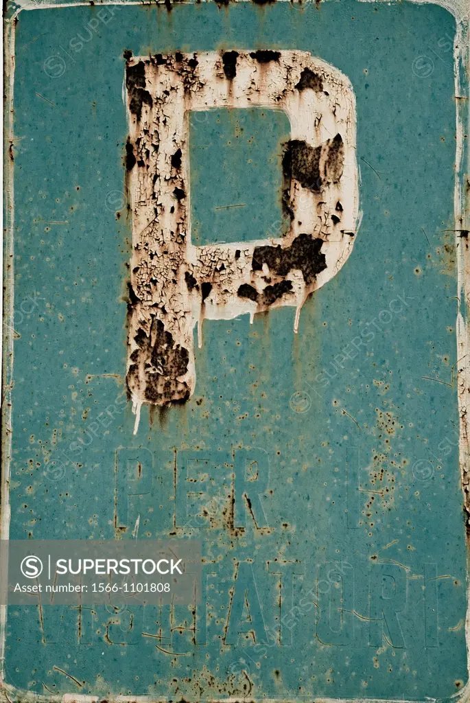 Rusty parking sign, Italy