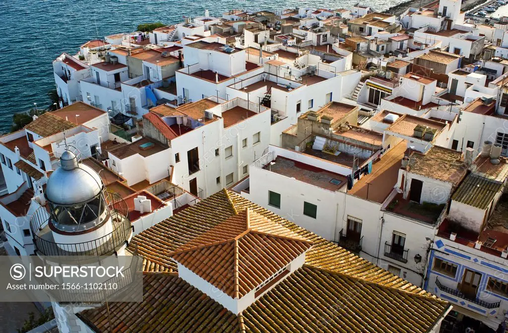 Elevated view of the lighthouse and the roofs of Peniscola and the Mediterranean Sea from the Castle - Peniscola - Baix Maestrat - Castellon province ...
