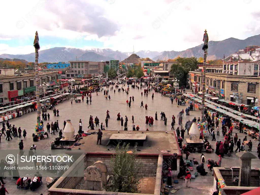 Barkhor Square in front of Jokhang Temple Lhasa Tibet lined with religious item market stalls and shops