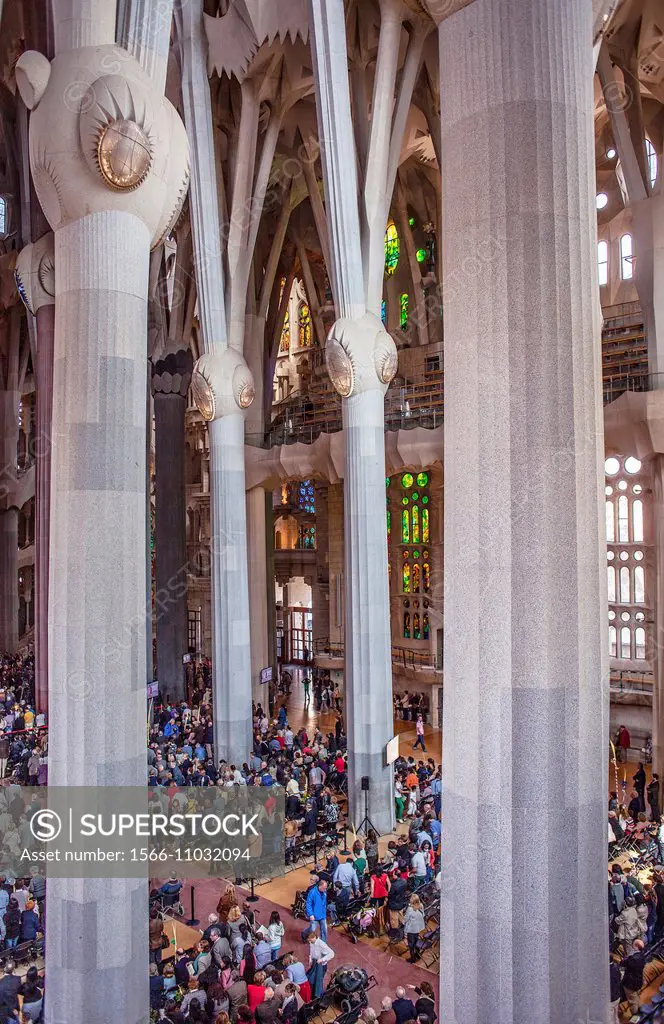 Mass,Interior of Basilica Sagrada Familia,nave, Barcelona, Catalonia, Spain.