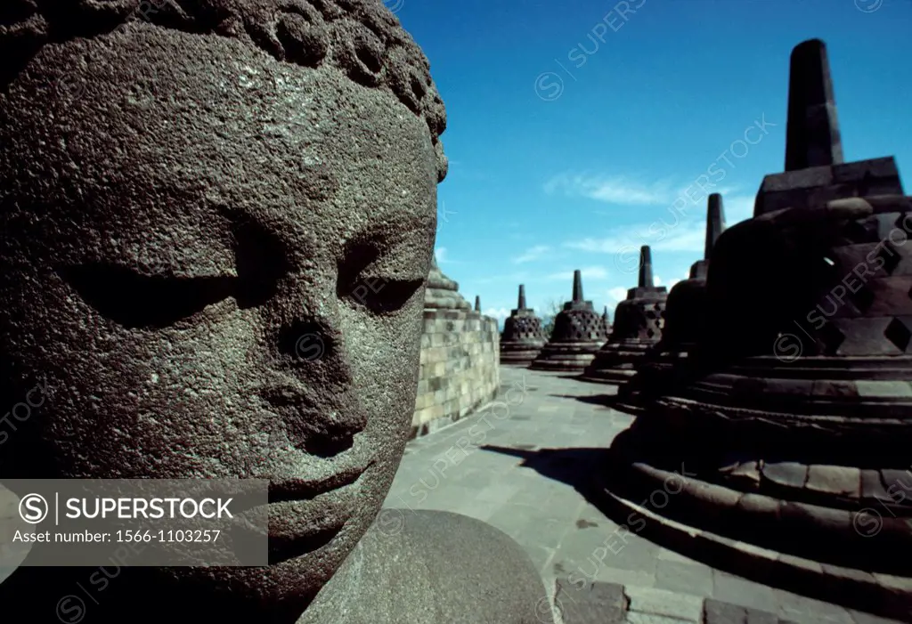 Face of Buddha with Stupas at Borobudur, Java, Indonesia