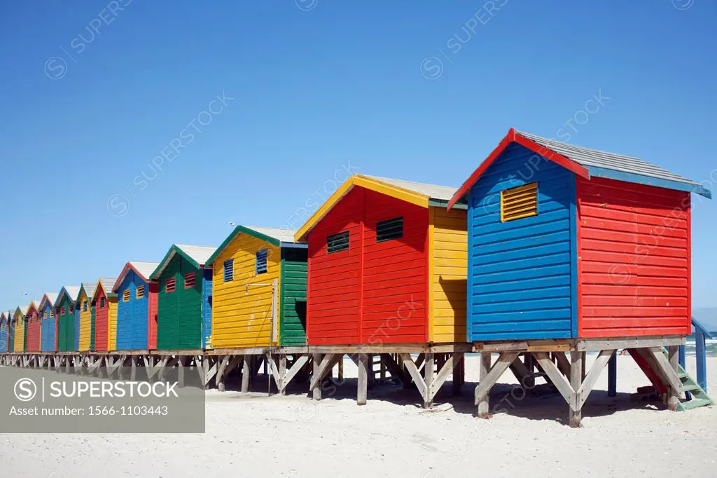 Colorful beach huts at the sandy beach of Muizenberg with blue sky, False Bay near Cape Town, South Africa