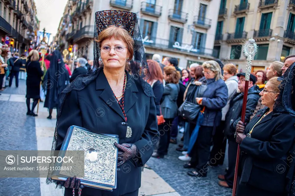 Mantillas in procession, sisterhood of Virgen de las Angustias,Good Friday, Easter week,plaza Sant Jaume,Barcelona, Catalonia, Spain.