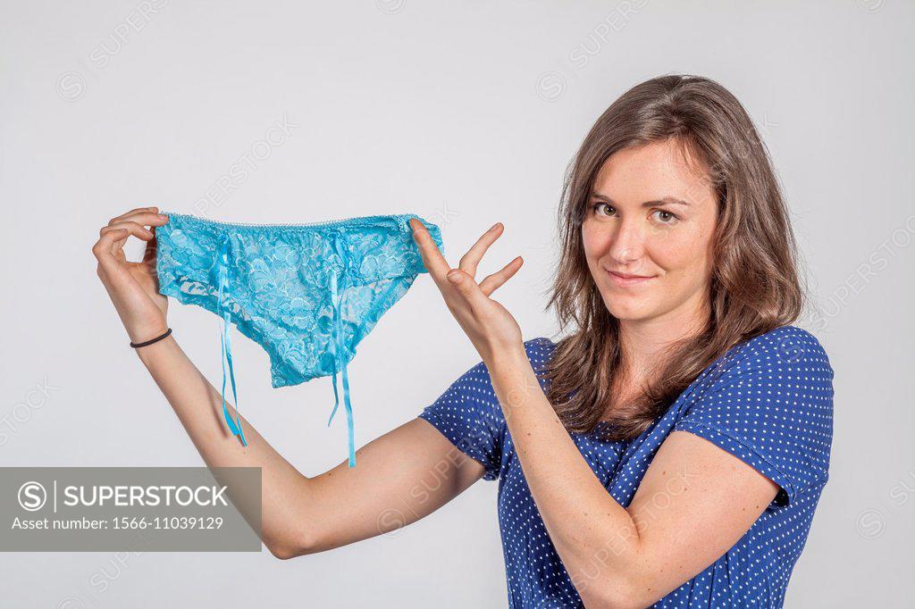 Young Playful Woman With Her Hand In Panties. Stock Photo, Picture