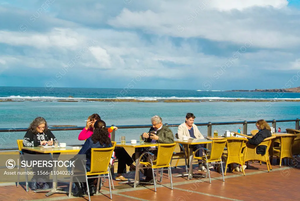 Cafe terrace along Paseo Cantera beach promenade, Las Palmas de Gran Canaria, the Canary Islands, Spain, Europe.
