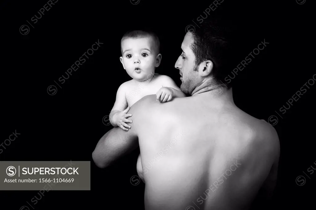 Young father with his baby  Man back