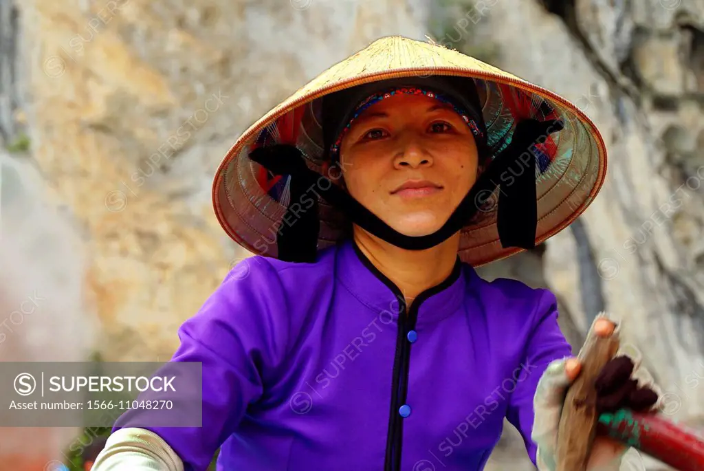 Vietnam. Boat lady at the Ha Long Bay.