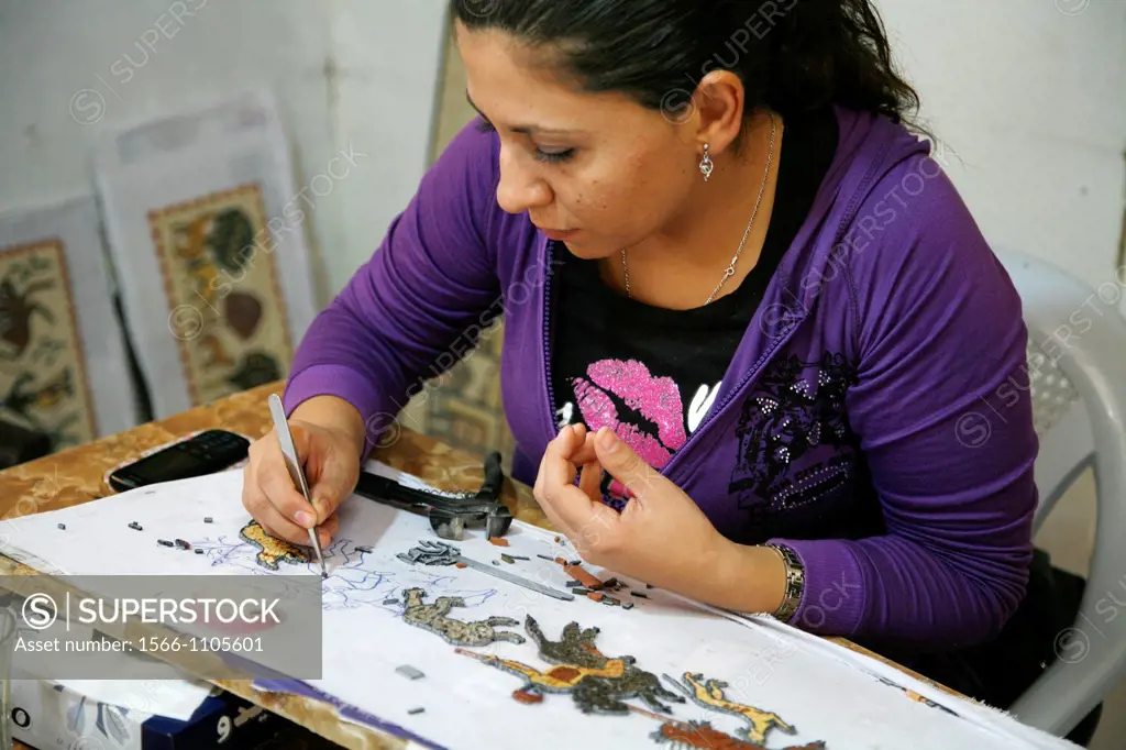 Women making mosaics in a workshop near Madaba, Jordan