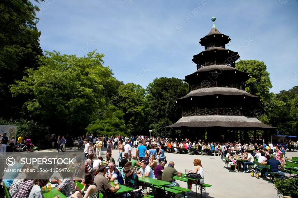 People sitting in the beer garden at Chinese Tower in the English Garden in Munich