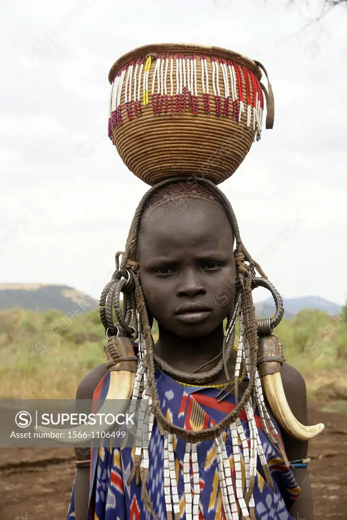 Africa, Ethiopia, Debub Omo Zone, Child of the Mursi tribe  A nomadic cattle herder ethnic group located in Southern Ethiopia, close to the Sudanese b...