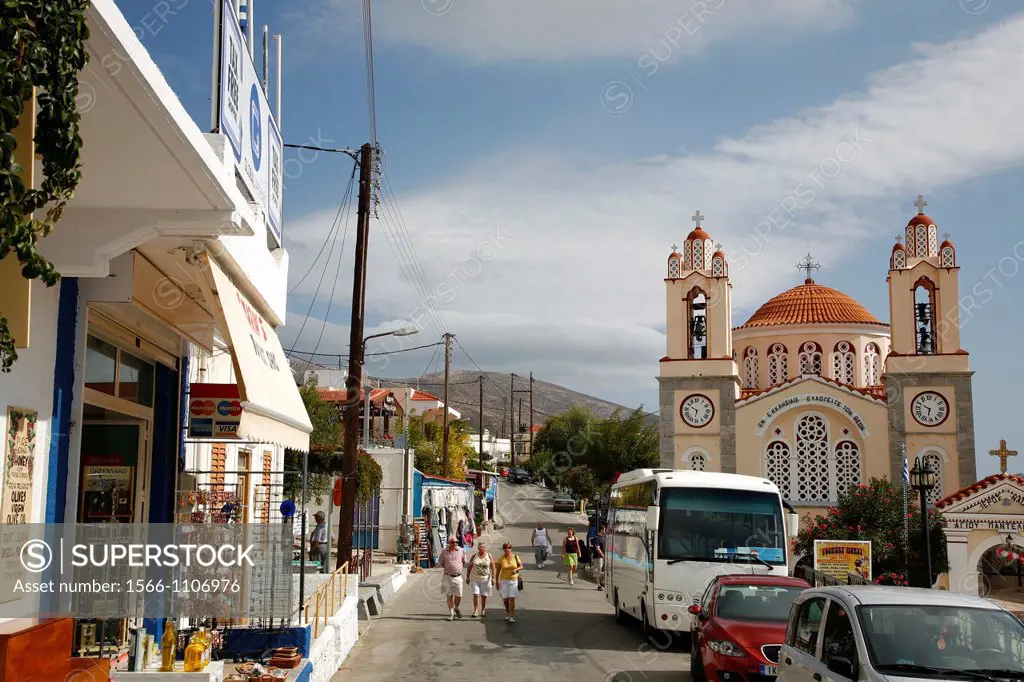 Main street in the village of Siana with Agios Pandelimonos Byzantine Church, Rhodes, Greece