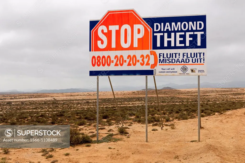 Warning sign of the Trans Hex Group Ltd  diamond mining company against the theft of diamonds, Northern Cape Province, South Africa