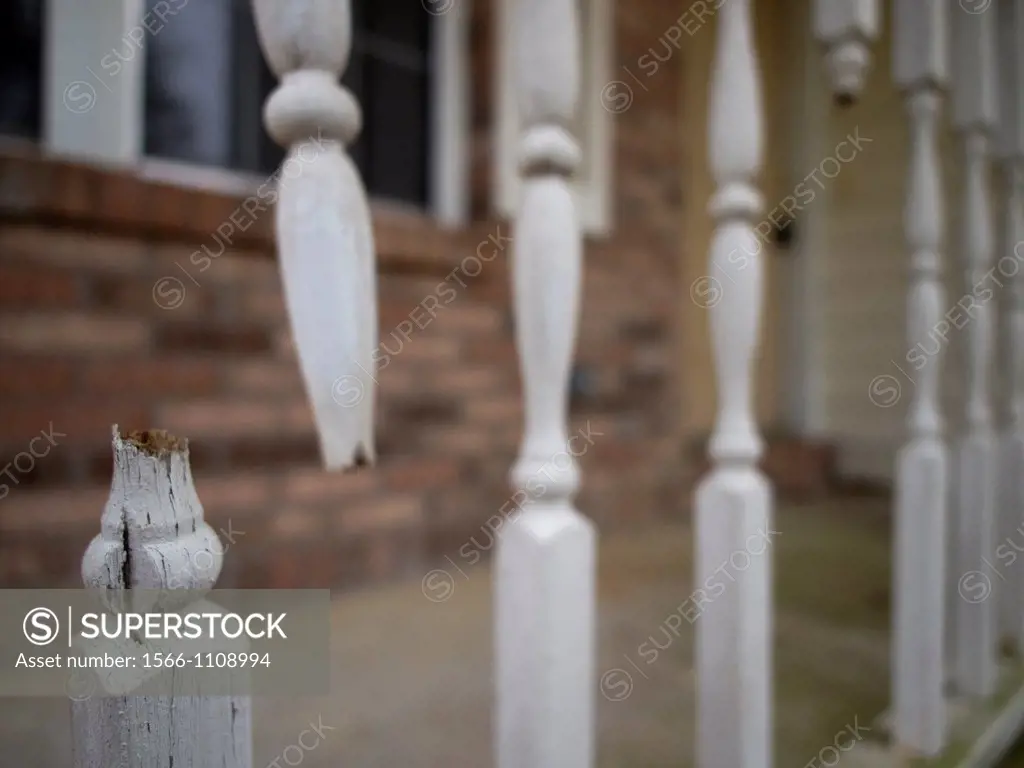 Front door with broken railing outside of a foreclosed home in Talahassee, Florida, United States