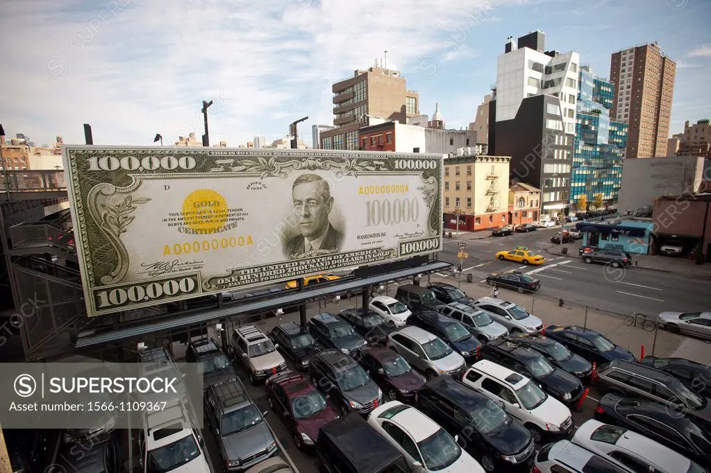 A billboard along the High Line Park in Chelsea in New York displaying ´The First $100, 000 I Ever Made´ by the artist John Baldessari The artwork con...