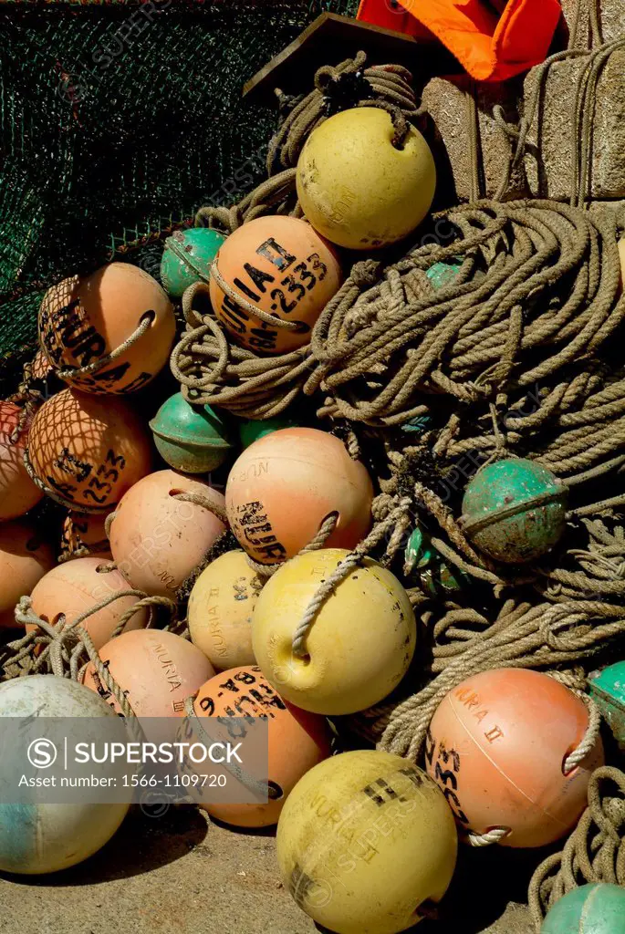 Buoys, and fishing in the fishing port of the population The Puerto de la Selva, Girona, Spain.