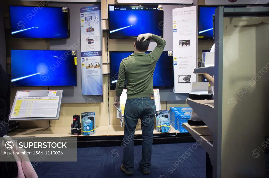 Shoppers browse flat-screen televisions in a Best Buy in New York over the Black Friday weekend A record setting 226 million shoppers went online and ...
