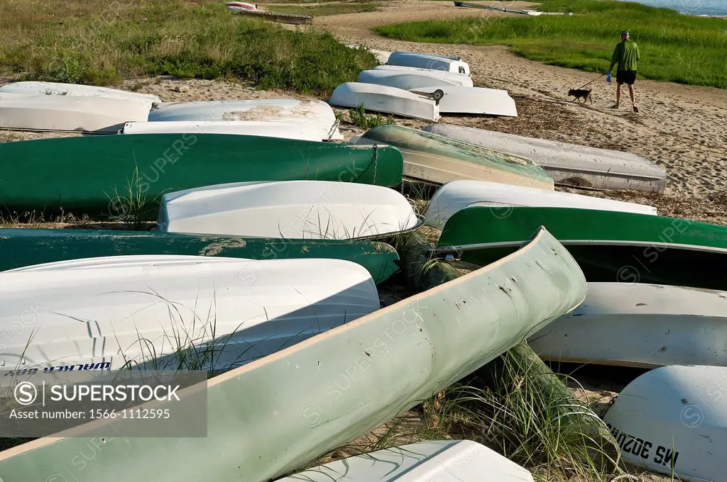 Rowboats and canoes stored on beach, Wellfleet, Cape Cod,