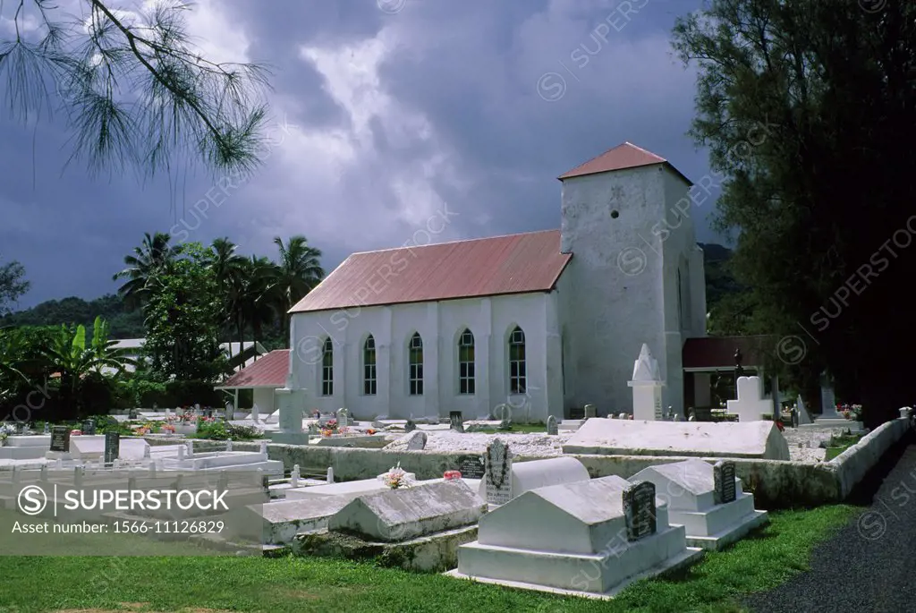 COOK ISLANDS, RAROTONGA, CHURCH WITH GRAVEYARD.