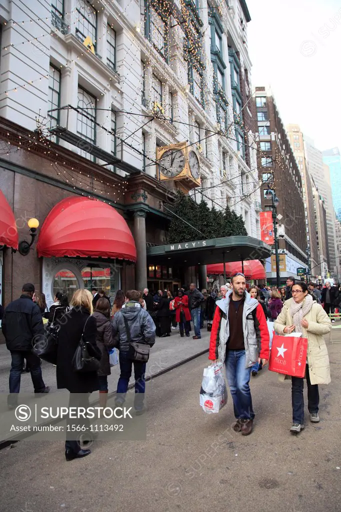 Macys Christmas shopping, decorations, Herald Square, Manhattan, New York City, USA on Friday December 16, 2011