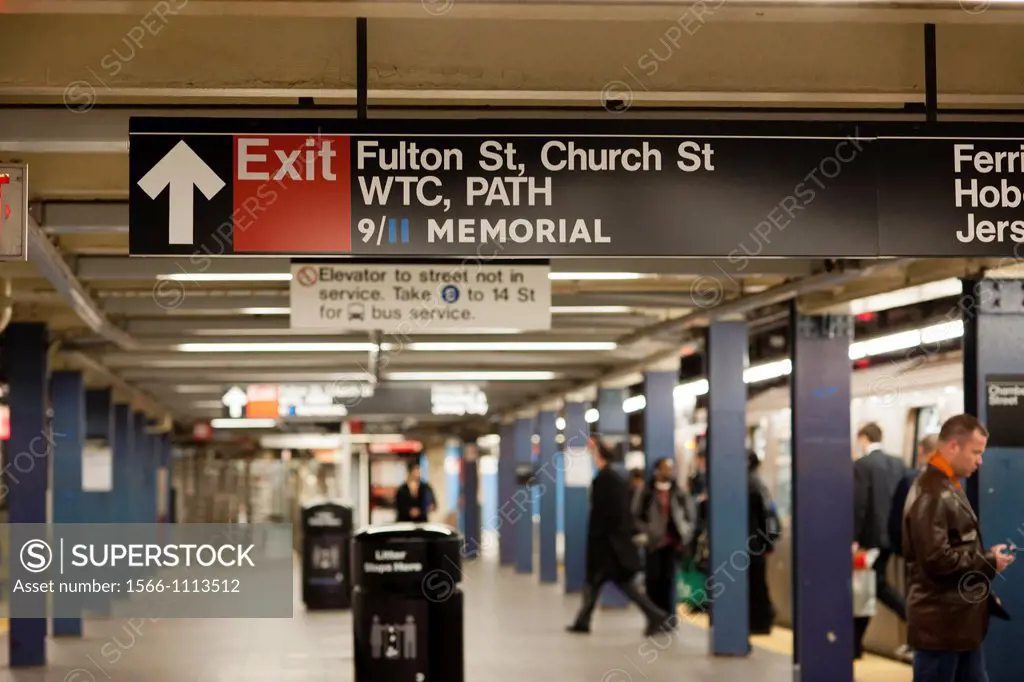 Signs in the World Trade Center station in the subway in New York direct visitors to the National 9/11 Memorial on the World Trade Center site