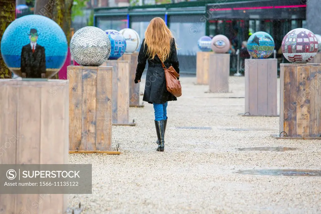 Woman walking through art installation near the Rijksmuseum in Amsterdam.