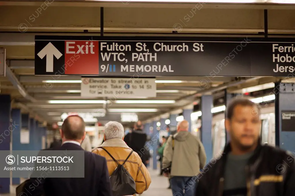 Signs in the World Trade Center station in the subway in New York direct visitors to the National 9/11 Memorial on the World Trade Center site