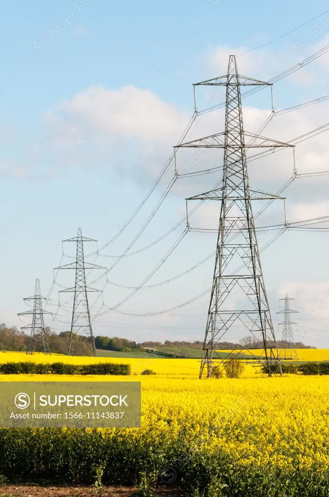 Europe, UK, England - electricity transmission towers and overhead line.