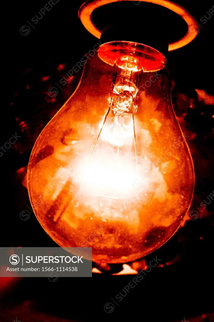 A close up of light bulb and filament