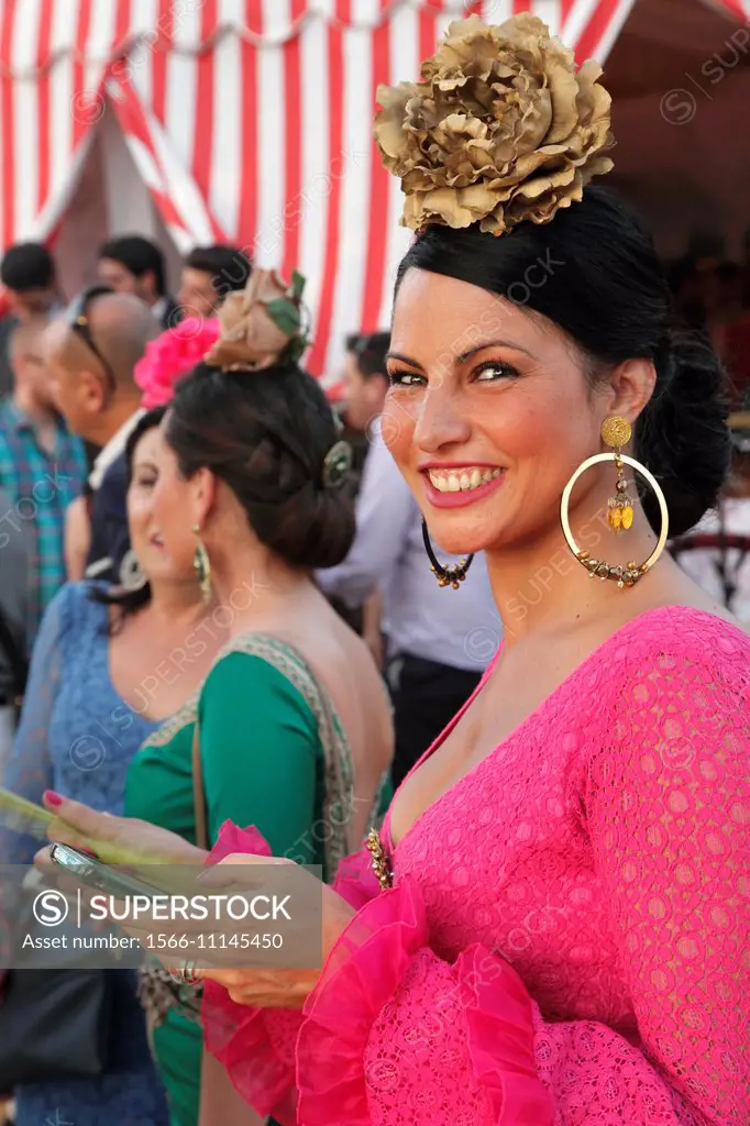 Spain, Andalusia, Seville, Fair, Feria de abril, people, festival, traditional dress, woman,.