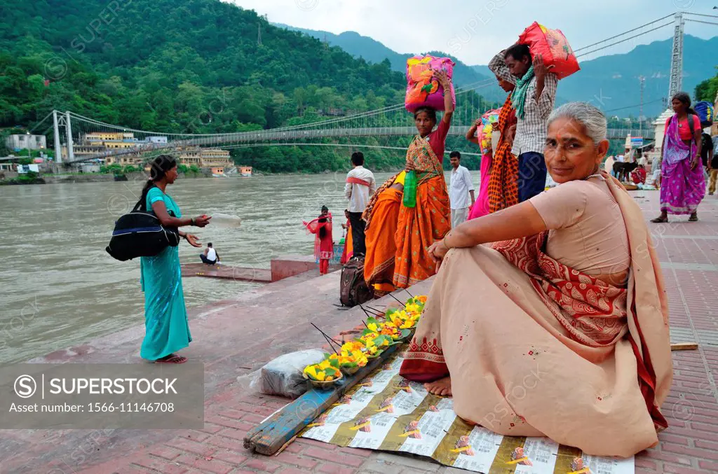 Hindu pilgrims gathered on banks of River Ganges, Rishikesh, India.
