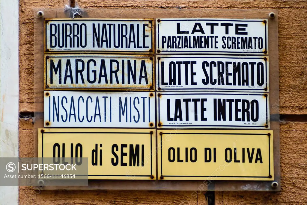 Shop sign in an Umbrian village advertising dairy products for sale.