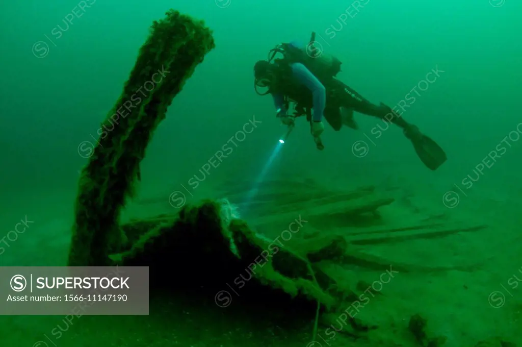 Scuba diver on shipwreck unknown sailboat 19th century, the Russian-Turkish war, Island Zmeinyj (Snake), Black Sea, Ukraine, Eastern Europe, Europe.