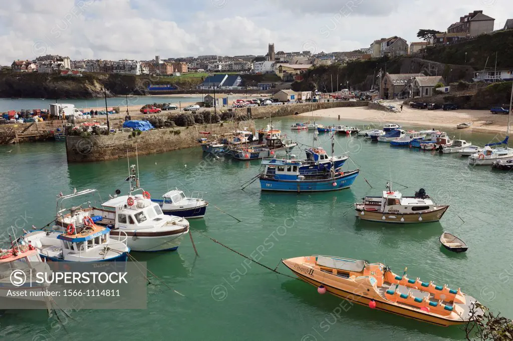Newquay, Cornwall, England, UK, Great Britain, Europe  View to the Cornish town with fishing boats moored in the harbour