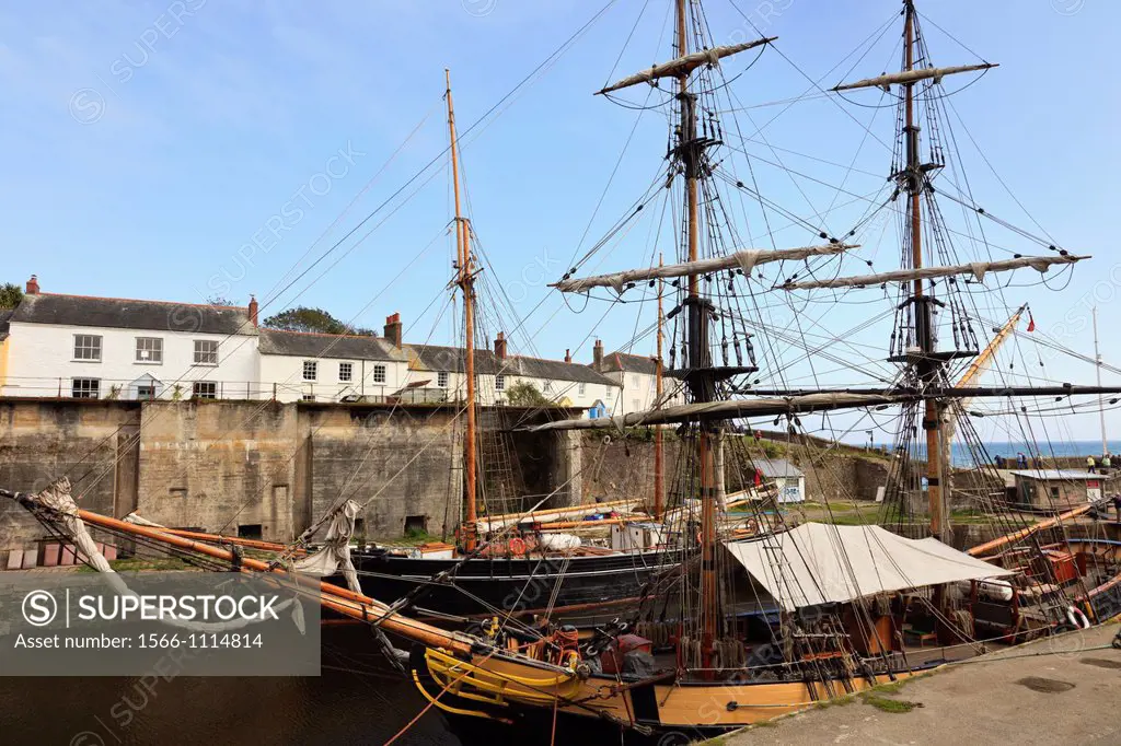 Charlestown, Cornwall, England, UK, Great Britain, Europe  Tall ships in the inner harbour with old cottages on the quayside