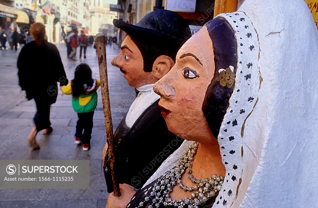 Dolls in entrance to Aperos y Viandas,Traditional food store,Rúa Mayor,Salamanca,Spain
