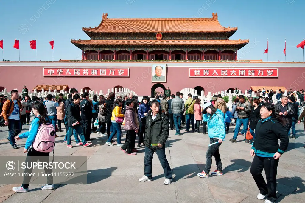 Chinese tourists in front of Gate of Heavenly Peace (Tiananmen) in Beijing, China.