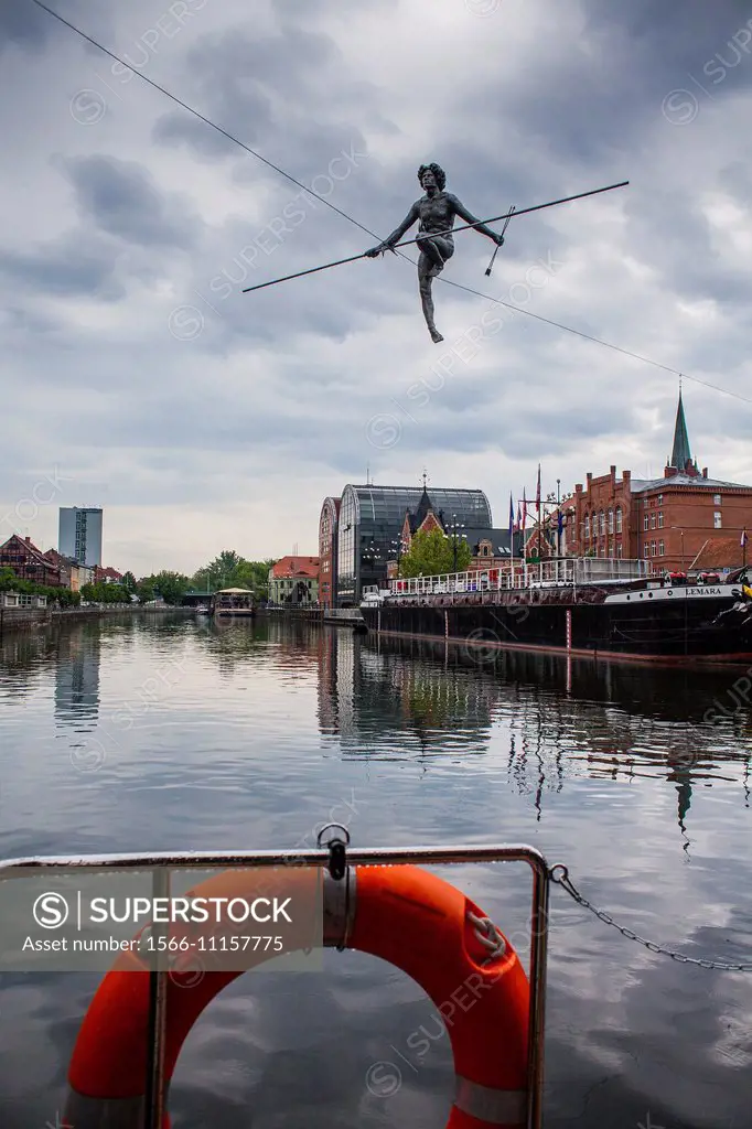 View from a boat, sculpture called ´Crossing the River´ over Brda river, Bydgoszcz, Poland.