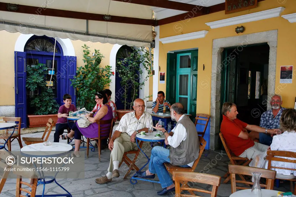 People sitting at Pahos cafe, Symi, Greece
