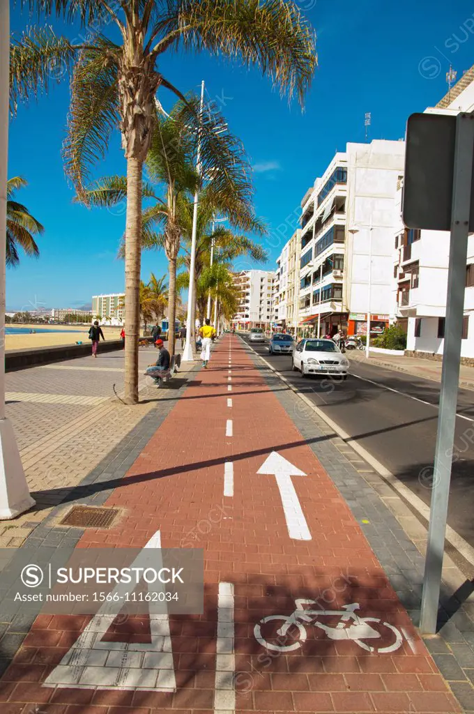 Bicycle lane going past Playa del Reducto beach, Arrecife, Lanzarote, Canary Islands, Spain, Europe.  