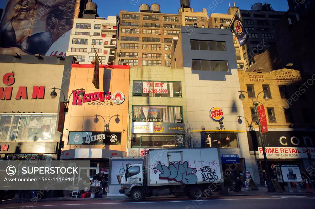 Wendy´s and Burger King fast food restaurants are almost next to each other on West 34th Street in New York According to market research Wendy´s is ab...