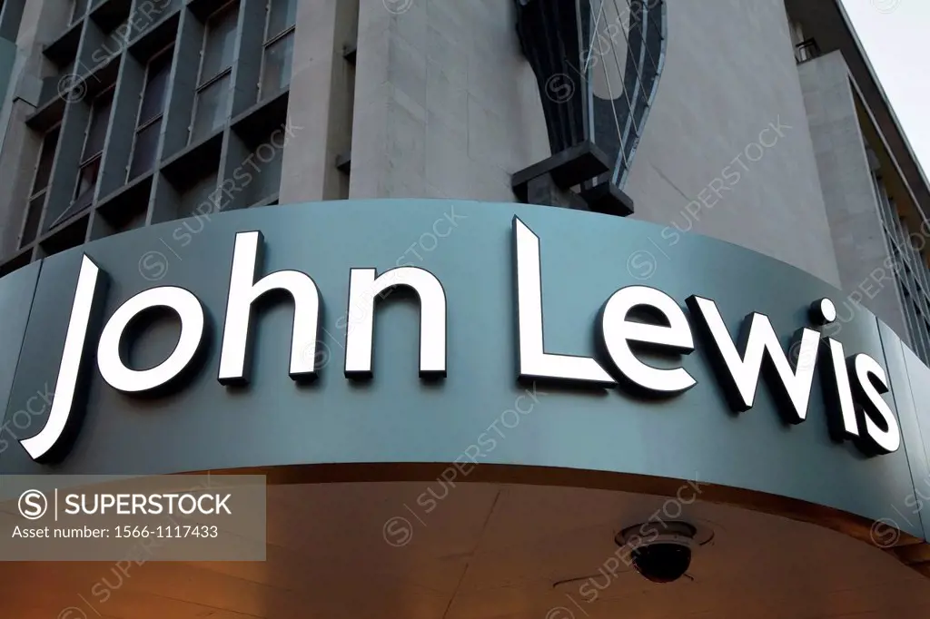 John Lewis Shop Logo in the West End in Oxford Street illuminated at night, London, England, UK