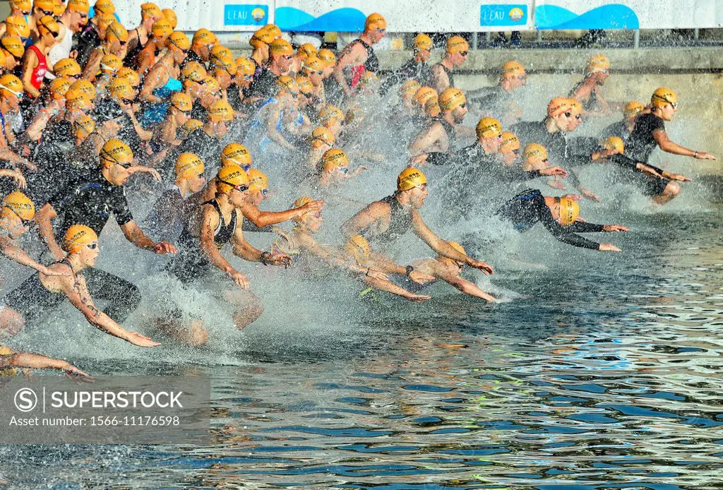 start of swimming race in Lake Geneva, International Geneva Triathlon 2014, Geneva, Switzerland.