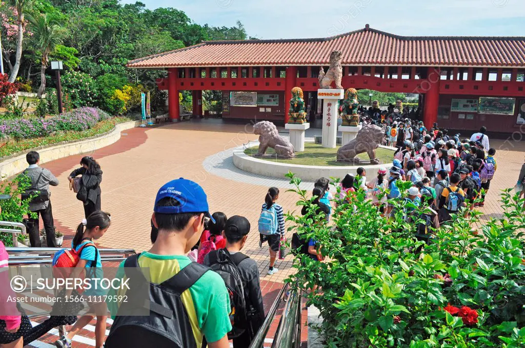Okinawa, Japan: young students visiting the Okinawa World theme park