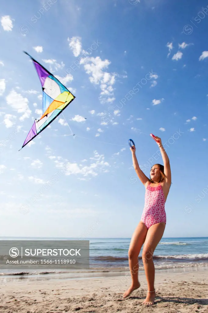 girl flying a kite