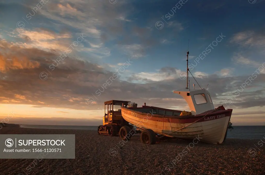 Fishing boat at sunset Weybourne Beach UK October