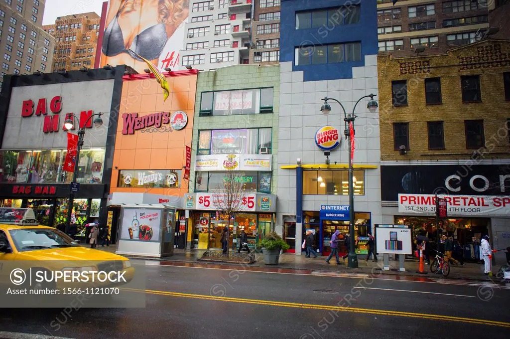 Wendy´s and Burger King fast food restaurants are almost next to each other on West 34th Street in New York According to market research Wendy´s is ab...